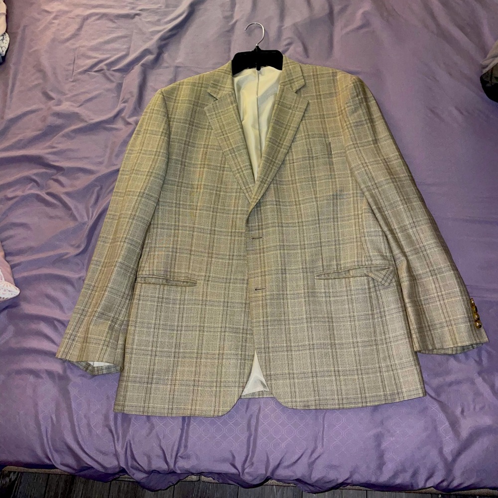 Brand New Suit Jacket. Never Worn. Very Comfortable and Good looking.
